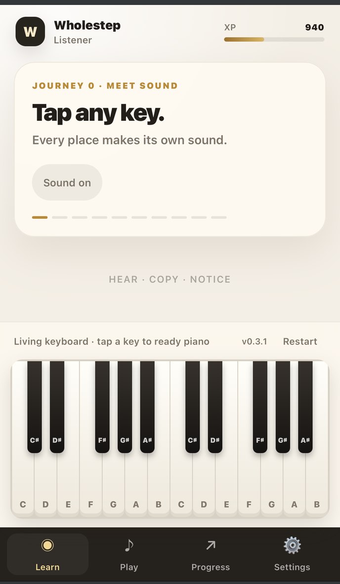Wholestep first lesson on a phone asking the learner to tap any key above a playable keyboard.